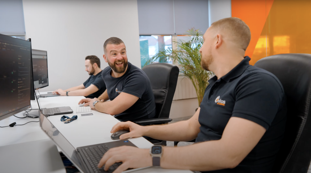 Darren and Damien working at desk