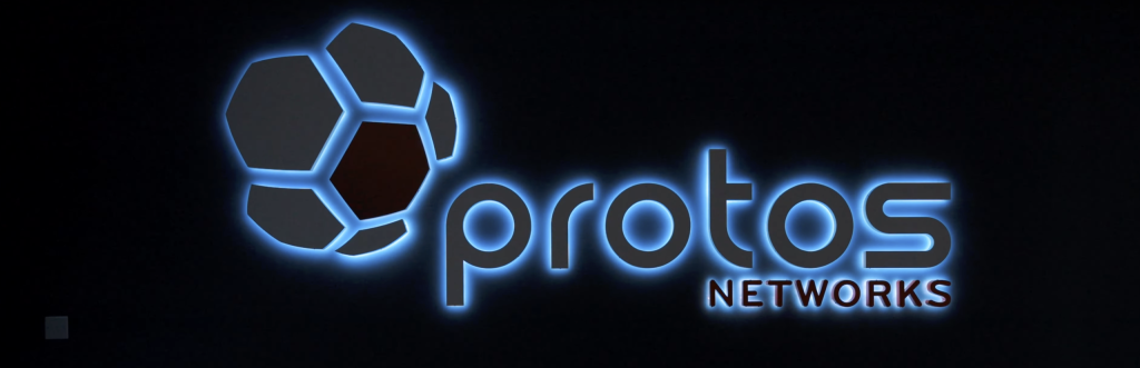 Protos Network Interal Sign Lit up in Blue